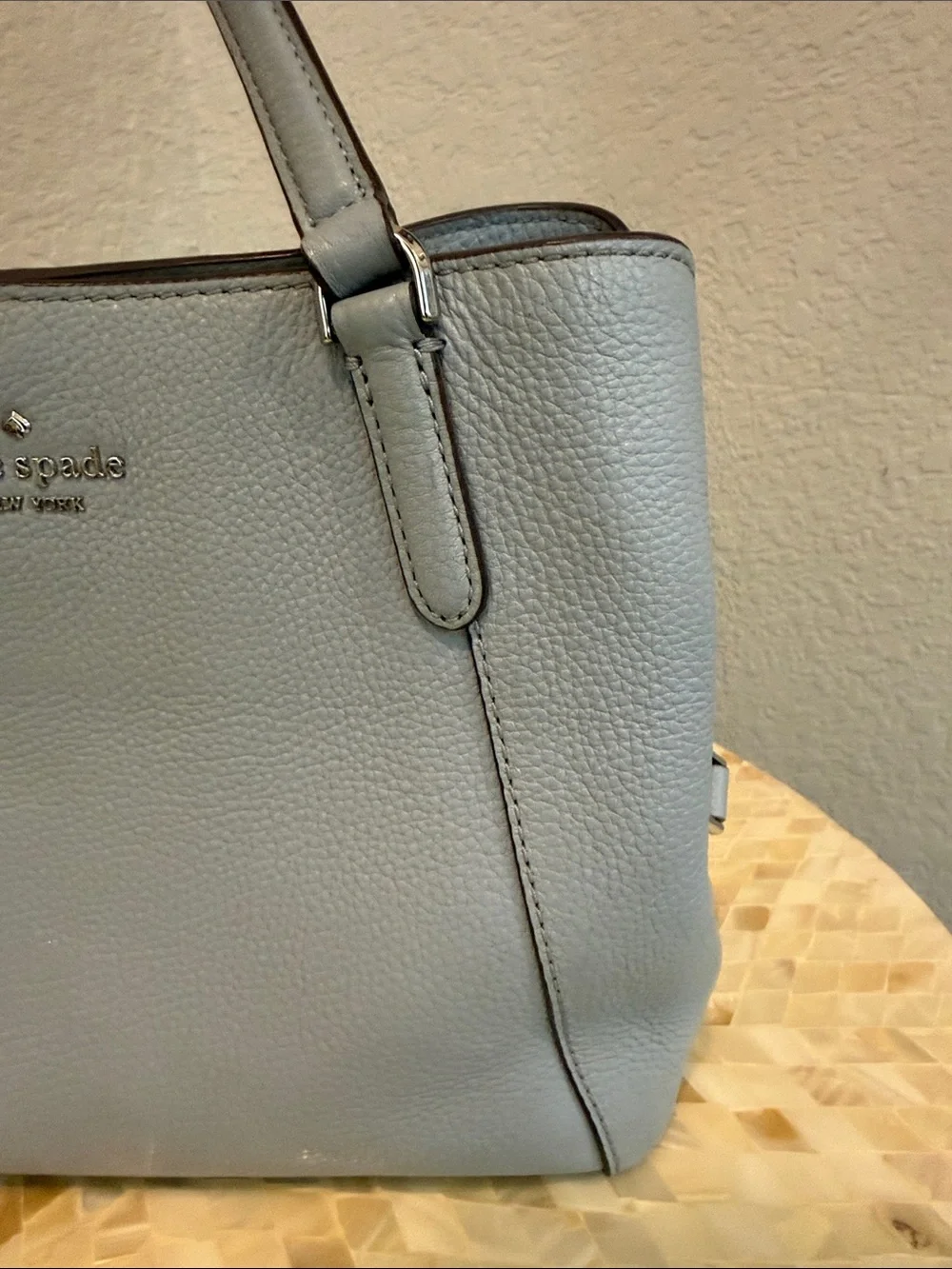 Kate Spade pale blue pebbled leather satchel with charm